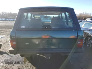 1994 Land Rover Range Rover with VIN SALHV1245RA640425, listed as a Copart auction lot 84764404 with 173,181 mi miles and Salvage Title. Bid and sale history available at DreamBid. Image 6.