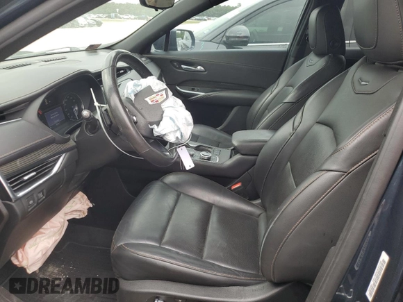 2020 Cadillac XT4 FWD Sport with VIN 1GYFZER40LF012664, listed as a Copart auction lot 54797915 with 59,393 mi miles and Salvage title. Bid and sale history available at DreamBid. Image 7.