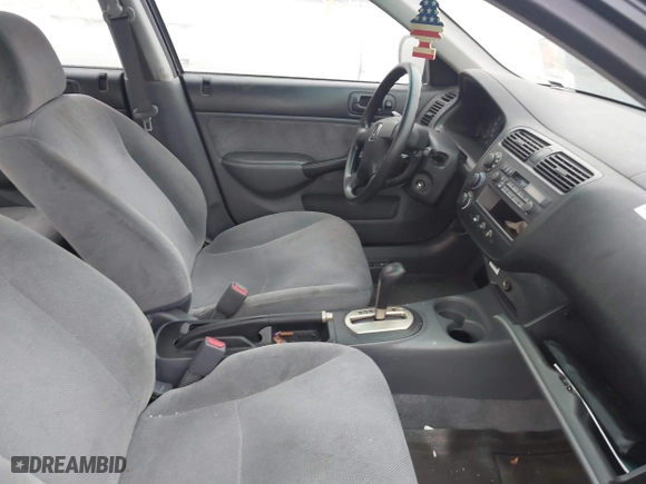 2001 Honda Civic LX with VIN 2HGES16511H554283, listed as a IAAI auction lot 41820187 with 999,999 mi miles. Bid and sale history available at carsss.com. Image 5.