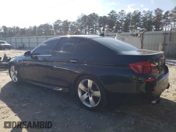 2015 BMW M5 with VIN WBSFV9C57FD594703, listed as a Copart auction lot 37756913 with 165,305 mi miles. Bid and sale history available at carsss.com. Image 2.