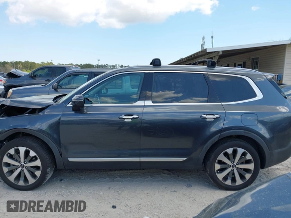2020 Kia Telluride S with VIN 5XYP64HC4LG048473, listed as a IAAI auction lot 41901438 with 125,089 mi miles and . Bid and sale history available at DreamBid. Image 13.
