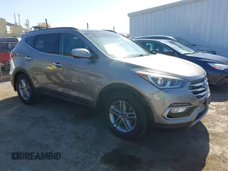 2017 Hyundai Santa Fe 2.4L z VIN 5XYZU3LB4HG446961, wystawiony jako IAAI lot #42214109 z przebiegiem 140 175 mil mil oraz . Historia ofert i sprzedaży dostępna na DreamBid. Obrazek 1.