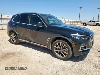 2021 BMW X5 sDrive40i with VIN 5UXCR4C09M9G23111, listed as a Copart auction lot 60509475 with 34,230 mi miles and Salvage title. Bid and sale history available at DreamBid. Image 4.