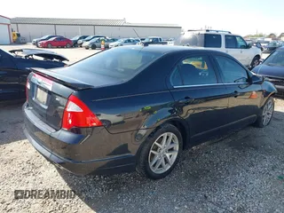2011 Ford Fusion SEL with VIN 3FAHP0JA7BR319183, listed as a IAAI auction lot 41829886 with 119,302 mi miles. Bid and sale history available at carsss.com. Image 4.