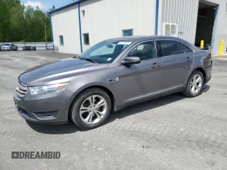 2014 Ford Taurus SEL z VIN 1FAHP2E85EG103475, wystawiony jako Copart lot #56899035 z przebiegiem 129 875 mil mil oraz Szkoda całkowita • Salvage title. Historia ofert i sprzedaży dostępna na DreamBid. Obrazek 1.