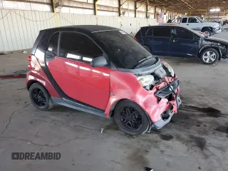2013 Smart fortwo Pure with VIN WMEEJ3BA2DK663995, listed as a Copart auction lot 54629895 with Not Provided miles and Salvage Title. Bid and sale history available at DreamBid. Image 4.
