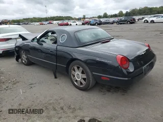 2005 Ford Thunderbird Deluxe z VIN 1FAHP60A55Y102032, wystawiony jako Copart lot #73761144 z przebiegiem 50 402 mil mil oraz Szkoda całkowita • Salvage title. Historia ofert i sprzedaży dostępna na DreamBid. Obrazek 2.