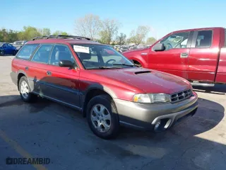 1997 Subaru Legacy Wagon Outback with VIN 4S3BG6854V7607136, listed as a IAAI auction lot 42023130 with 218,785 mi miles. Bid and sale history available at carsss.com. Image 1.