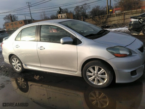 2010 Toyota Yaris with VIN JTDBT4K3XA1360452, listed as a IAAI auction lot 41557092 with 107,989 mi miles. Bid and sale history available at carsss.com. Image 1.