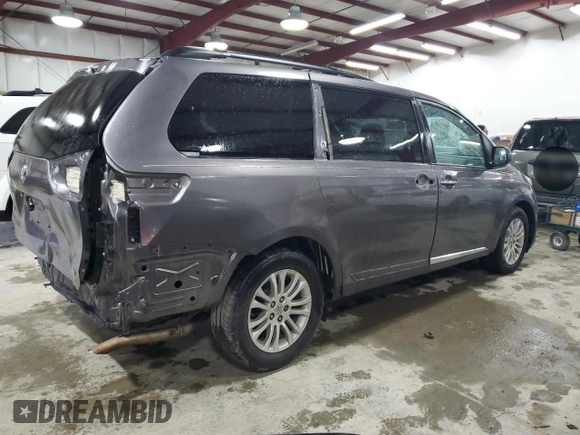 2015 Toyota Sienna XLE с VIN 5TDYK3DC4FS650605, выставлен на аукционе Copart как лот 58217575 с пробегом 174 364 миль миль и Списание • Salvage title. История ставок и продаж доступна на DreamBid. Изображение 3.