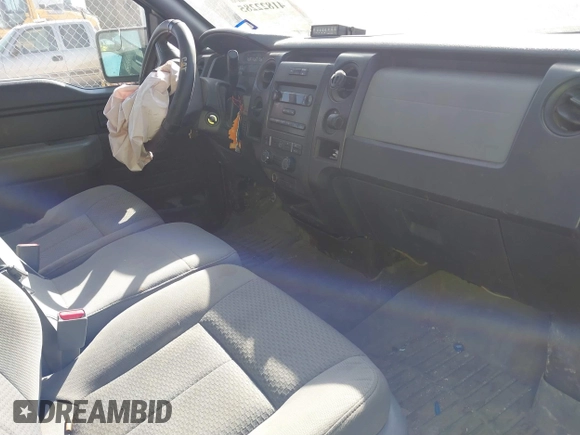 2013 Ford F-150 XL with VIN 1FTMF1CM2DKE67824, listed as a IAAI auction lot 41822285 with 181,957 mi miles and . Bid and sale history available at carsss.com. Image 5.