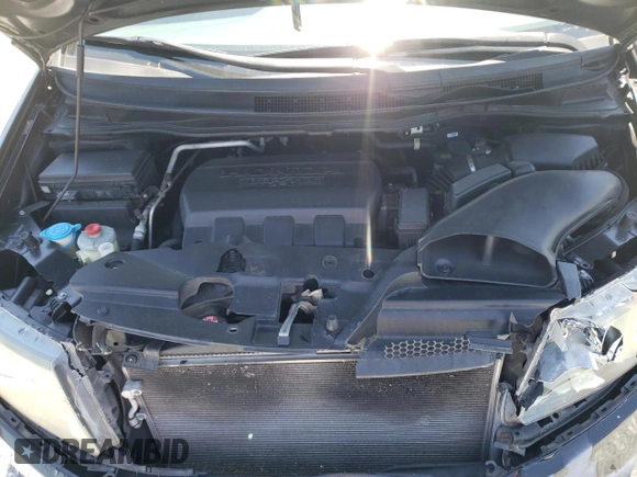 2014 Honda Odyssey Touring with VIN 5FNRL5H97EB016624, listed as a Copart auction lot 53444645 with 244,126 mi miles and Salvage Title. Bid and sale history available at DreamBid. Image 13.