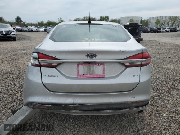 2018 Ford Fusion SE z VIN 3FA6P0H74JR112086, wystawiony jako Copart lot #56630275 z przebiegiem 123 300 mil mil oraz Szkoda całkowita • Salvage title. Historia ofert i sprzedaży dostępna na DreamBid. Obrazek 6.
