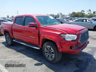 2020 Toyota Tacoma SR5 z VIN 3TMAZ5CN1LM139635, wystawiony jako IAAI lot #42313763 z przebiegiem 72 752 mil mil oraz . Historia ofert i sprzedaży dostępna na DreamBid. Obrazek 1.