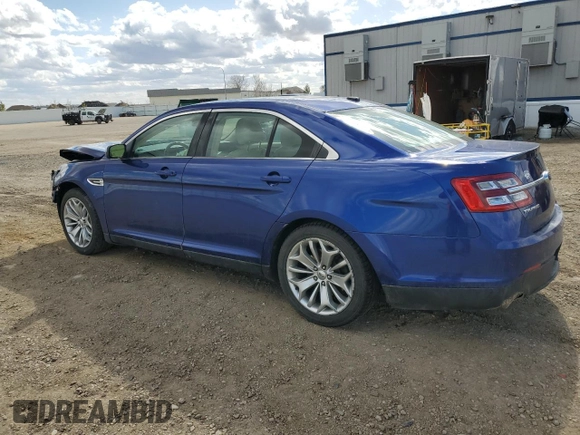 2013 Ford Taurus Limited with VIN 1FAHP2F86DG100713, listed as a Copart auction lot 52599085 with 168,771 mi miles and Salvage title. Bid and sale history available at DreamBid. Image 2.