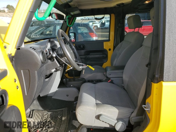 2009 Jeep Wrangler Rubicon with VIN 1J4GA64109L707008, listed as a Copart auction lot 87492674 with 157,104 mi miles and Salvage Title. Bid and sale history available at DreamBid. Image 7.