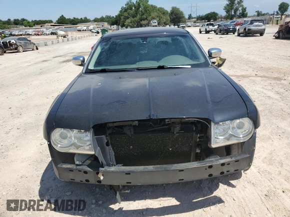 2009 Chrysler 300 with VIN 2C3KA63T39H580730, listed as a Copart auction lot 64933564 with 155,403 mi miles and Salvage Title. Bid and sale history available at carsss.com. Image 5.