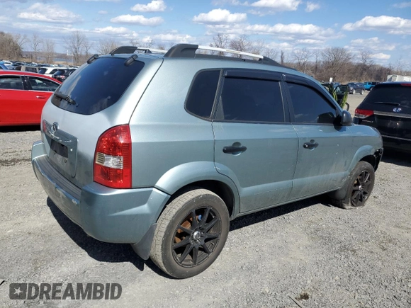 2005 Hyundai Tucson GL with VIN KM8JM12B95U185156, listed as a Copart auction lot 49605355 with 103,367 mi miles and Salvage Title. Bid and sale history available at carsss.com. Image 3.