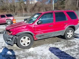 2001 Ford Escape XLT with VIN 1FMYU04131KB51488, listed as a IAAI auction lot 41363166 with 327,580 mi miles. Bid and sale history available at carsss.com. Image 14.