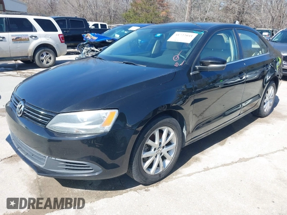 2014 Volkswagen Jetta Sedan SE w/Connectivity with VIN 3VWD07AJ5EM382352, listed as a IAAI auction lot 41722041 with 222,806 mi miles. Bid and sale history available at carsss.com. Image 2.