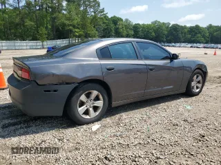 2013 Dodge Charger SE z VIN 2C3CDXBG4DH664652, wystawiony jako Copart lot #57317865 z przebiegiem 160 497 mil mil oraz Tytuł czysty. Historia ofert i sprzedaży dostępna na DreamBid. Obrazek 3.