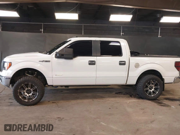 2013 Ford F-150 XL with VIN 1FTFW1ET8DFB48563, listed as a IAAI auction lot 42103243 with 257,778 mi miles. Bid and sale history available at carsss.com. Image 14.