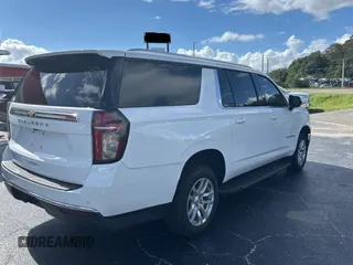 2021 Chevrolet Suburban LS with VIN 1GNSCBKD7MR301059, listed as a Copart auction lot 77436554 with 54,279 mi miles and Clean Title. Bid and sale history available at DreamBid. Image 4.