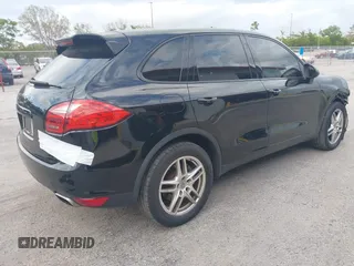 2014 Porsche Cayenne with VIN WP1AA2A28ELA06484, listed as a IAAI auction lot 41655867 with 179,441 mi miles and . Bid and sale history available at DreamBid. Image 4.