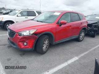 2016 Mazda CX-5 Touring with VIN JM3KE2CY3G0877185, listed as a IAAI auction lot 41729243 with 144,656 mi miles. Bid and sale history available at carsss.com. Image 17.