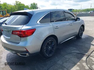 2018 Acura MDX Technology with VIN 5J8YD4H57JL003610, listed as a IAAI auction lot 42127585 with 82,633 mi miles and . Bid and sale history available at DreamBid. Image 4.