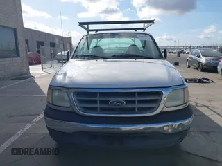 2000 Ford F-150 XL with VIN 1FTRF17WXYKA72880, listed as a IAAI auction lot 41989317 with 149,967 mi miles. Bid and sale history available at carsss.com. Image 12.