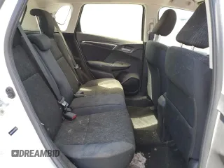 2016 Honda Fit LX z VIN JHMGK5H59GX027526, wystawiony jako Copart lot #57831785 z przebiegiem Nie podano mil oraz Szkoda całkowita • Salvage title. Historia ofert i sprzedaży dostępna na DreamBid. Obrazek 10.