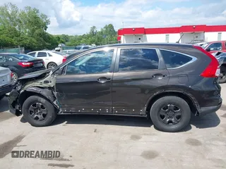 2015 Honda CR-V LX with VIN 2HKRM4H38FH601802, listed as a IAAI auction lot 42177101 with 71,775 mi miles and . Bid and sale history available at DreamBid. Image 15.