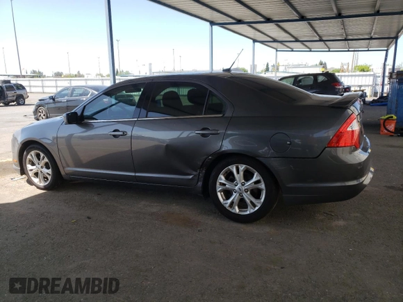 2012 Ford Fusion SE z VIN 3FAHP0HAXCR231865, wystawiony jako Copart lot #52644815 z przebiegiem 153 058 mil mil oraz Szkoda całkowita • Salvage title. Historia ofert i sprzedaży dostępna na DreamBid. Obrazek 2.