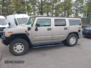 2003 Hummer H2 with VIN 5GRGN23U73H142389, listed as a IAAI auction lot 42219627 with 78,547 mi miles. Bid and sale history available at carsss.com. Image 14.