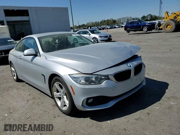 2014 BMW 4 Series 428i xDrive with VIN WBA3N5C51EF716572, listed as a Copart auction lot 52086365 with 209,742 mi miles and Salvage Title. Bid and sale history available at DreamBid. Image 11.