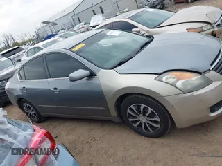 2009 Nissan Altima SL with VIN 1N4AL21E59N470273, listed as a IAAI auction lot 42030524 with 184,286 mi miles and . Bid and sale history available at DreamBid. Image 14.