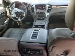 2016 GMC Yukon Denali with VIN 1GKS1CKJ7GR264548, listed as a Copart auction lot 62982234 with 105,724 mi miles and Salvage Title. Bid and sale history available at carsss.com. Image 8.