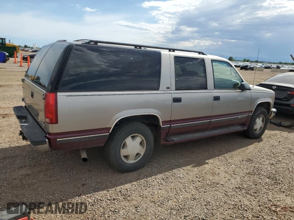 1998 GMC Suburban with VIN 1GKFK16RXWJ721305, listed as a Copart auction lot 64112165 with 197,756 mi miles and Clean title. Bid and sale history available at DreamBid. Image 3.