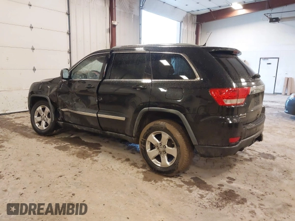 2012 Jeep Grand Cherokee Laredo with VIN 1C4RJFAT1CC225479, listed as a IAAI auction lot 41709911 with 227,150 mi miles. Bid and sale history available at carsss.com. Image 3.