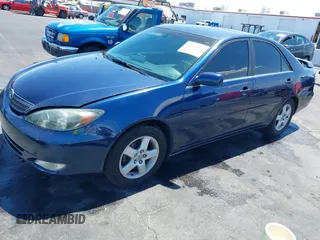 2003 Toyota Camry LE with VIN JTDBE32K130243265, listed as a IAAI auction lot 42145871 with Not Provided miles and . Bid and sale history available at DreamBid. Image 6.