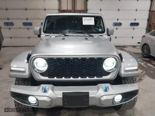 2024 Jeep Wrangler 4xe High Altitude with VIN 1C4RJXU6XRW218114, listed as a IAAI auction lot 41519843 with 17,317 mi miles. Bid and sale history available at carsss.com. Image 12.