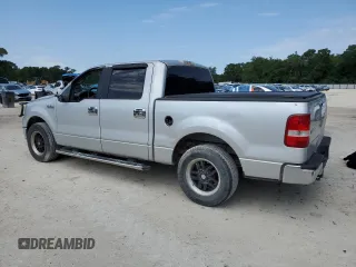 2006 Ford F-150 XLT with VIN 1FTRW12W06KD84579, listed as a Copart auction lot 55090155 with 296,917 mi miles and Salvage Title. Bid and sale history available at DreamBid. Image 2.