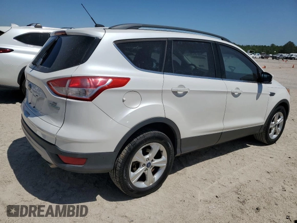 2015 Ford Escape SE with VIN 1FMCU0GXXFUB61487, listed as a Copart auction lot 52116665 with 115,921 mi miles and Salvage Title. Bid and sale history available at DreamBid. Image 3.