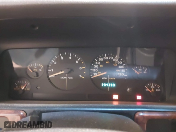 1996 Jeep Grand Cherokee Laredo with VIN 1J4GZ58S5TC182766, listed as a IAAI auction lot 41372356 with 234,390 mi miles. Bid and sale history available at carsss.com. Image 7.