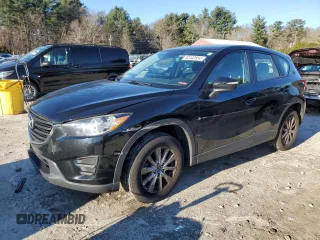 2016 Mazda CX-5 Sport with VIN JM3KE2BE1G0629430, listed as a Copart auction lot 82442654 with 130,289 mi miles and Salvage Title. Bid and sale history available at carsss.com. Image 1.