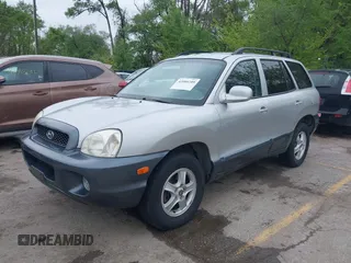 2002 Hyundai Santa Fe GLS with VIN KM8SC73D42U152166, listed as a IAAI auction lot 42088109 with 199,051 mi miles. Bid and sale history available at carsss.com. Image 2.