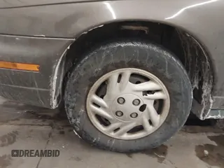 1998 Saturn SL z VIN 1G8ZH528XWZ240574, wystawiony jako IAAI lot #41588681 z przebiegiem Nie podano mil oraz . Historia ofert i sprzedaży dostępna na DreamBid. Obrazek 11.