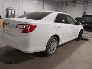 2014 Toyota Camry L with VIN 4T1BF1FK4EU734657, listed as a IAAI auction lot 41963449 with 167,826 mi miles. Bid and sale history available at carsss.com. Image 4.