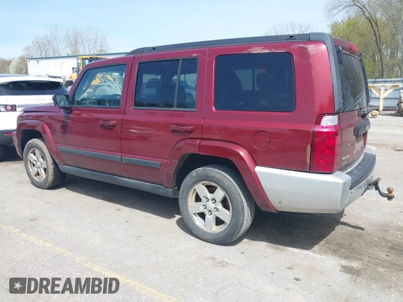 2007 Jeep Commander Sport with VIN 1J8HG48K27C661932, listed as a IAAI auction lot 42132895 with 255,707 mi miles. Bid and sale history available at carsss.com. Image 3.